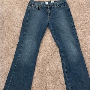 Mid rise bootcut lucky rise jeans. Dark wash